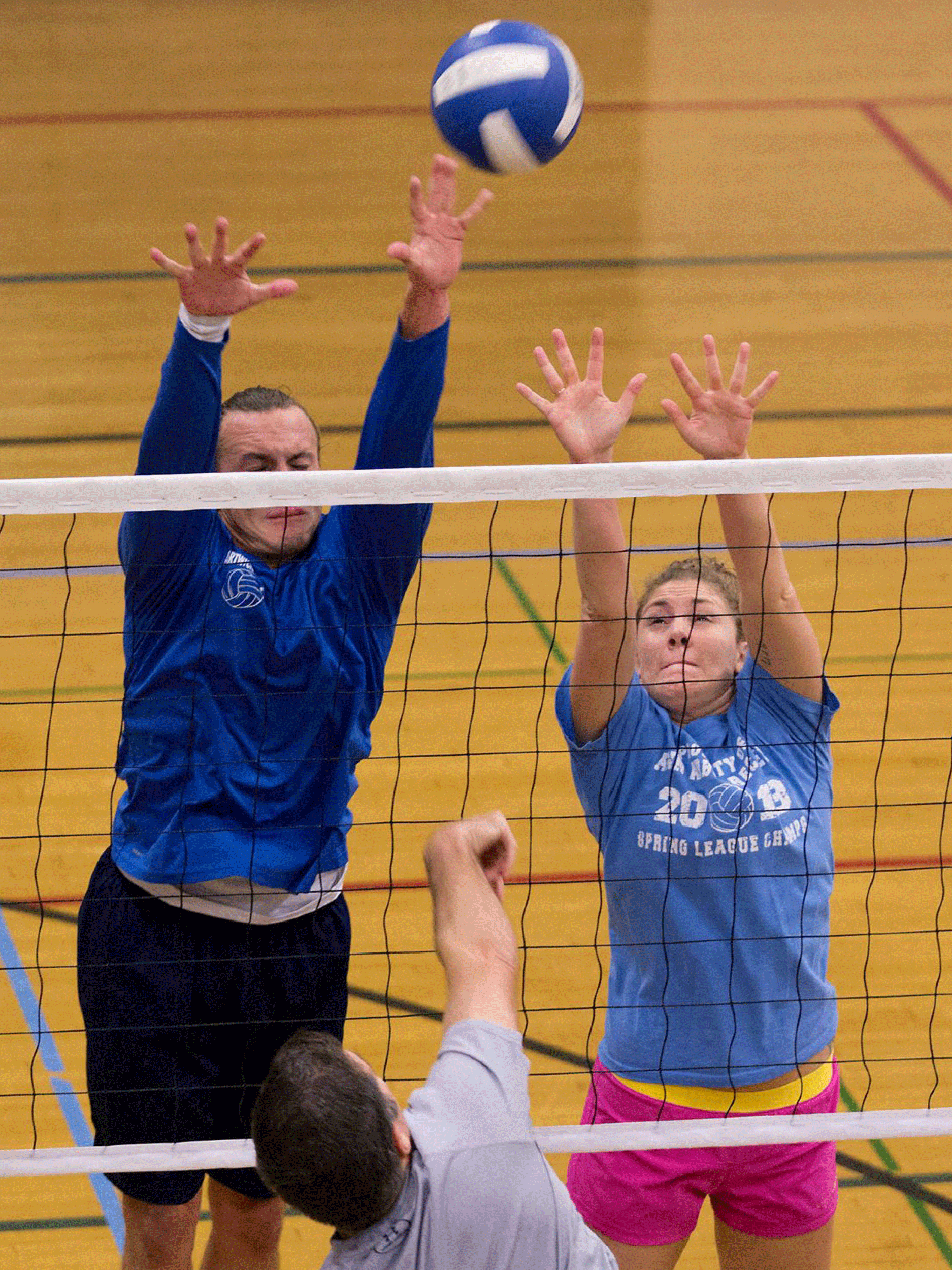 jcc-athletics-adult-volleyball-coed-team-blocking-spike